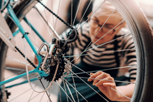 women completing bike maintenance