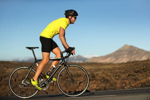 male cyclist on road bike