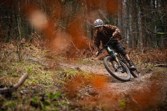 MTB riding in forest during Autumn. Starling cycles